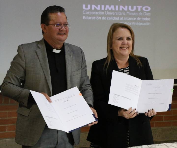 rector Uniminuto Harold Castilla y funcionaria IFC rector Uniminuto Harold Castilla y funcionaria IFC