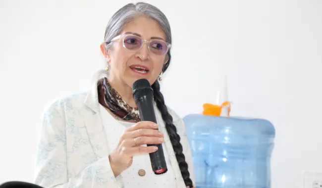 Palabras por la representante de la comunidad