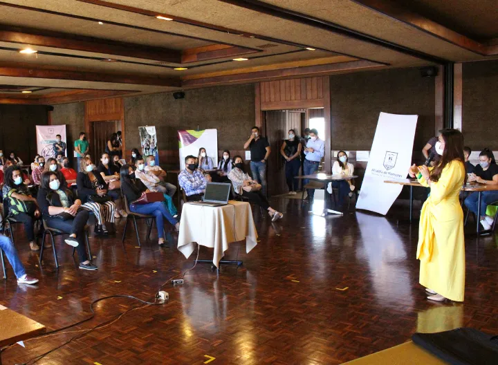Auditorio escuchando la presentación de la subdirectora general de Centros progresa
